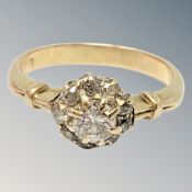 An 18ct gold diamond cluster ring, centre stone approx. 0.