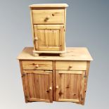 A pine double door cabinet fitted with two drawers together with a pine bedside cabinet
