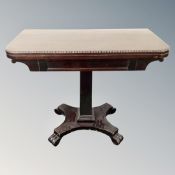 A 19th century mahogany pedestal card table