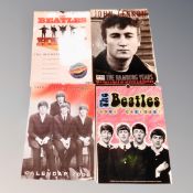 Four Beatles calendars