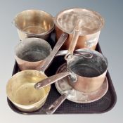 A tray of 19th century copper lidded sauce pan and three further copper and brass pans,
