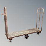 A vintage metal framed porter's trolley