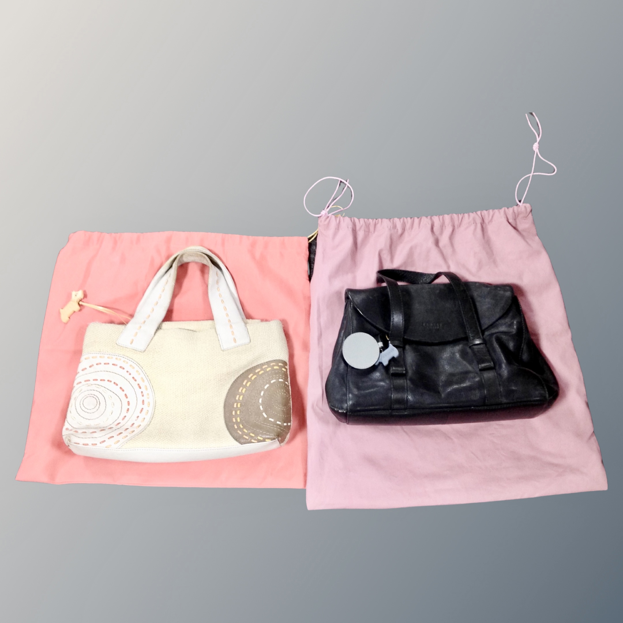 Two Radley hand bags with dust bags