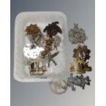 A box of Army cap badges