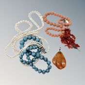 Coral and other items and a gold mounted piece of amber