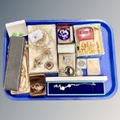 A tray of costume jewellery, cufflinks,