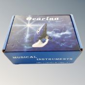 An Ocarina musical instrument, boxed.