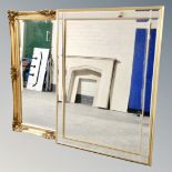 A traditional gilt framed bevelled mirror together with a further gilt framed mirror