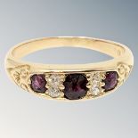 A gold diamond and ruby ring, size N CONDITION REPORT: Marks rubbed. 4g.