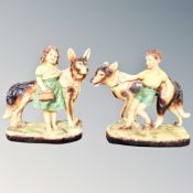 A pair of Art Deco chalk figures of children with Alsatians