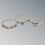 Three vacant platinum ring mounts (3) CONDITION REPORT: 15.