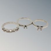 Three vacant platinum ring mounts (3) CONDITION REPORT: 15.