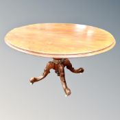 A Victorian mahogany oval pedestal dining table
