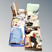 Three boxes and crate containing haberdashery items