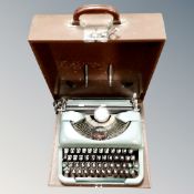 A vintage Imperial typewriter in case