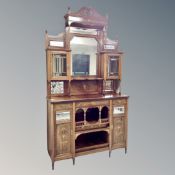 A Victorian inlaid rosewood mirror backed chiffonier