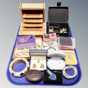 A tray of Anglo-Indian Vizagapatam cigarette box, costume jewellery, bangles, glass pendants,