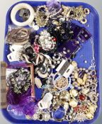 A tray of jewellery box, costume jewellery, earrings, polished stone necklace,