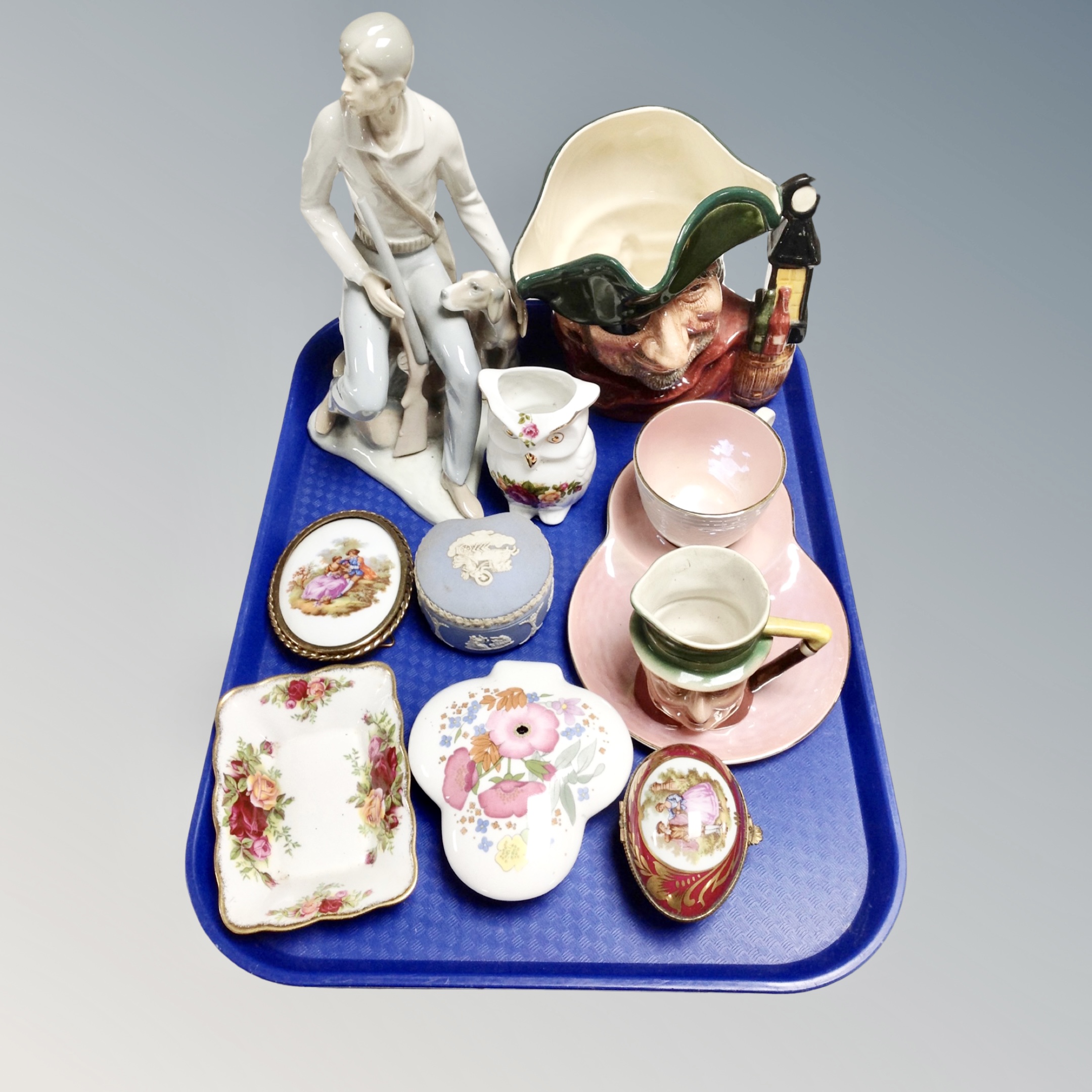 A tray of assorted ceramics, large Royal Doulton character jug Smuggler, Spanish figure,