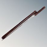 A sword stick in leather case