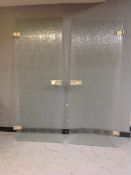 Two pairs of 1970's opaque textured glass interior doors with brass fittings