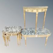 A gilt and faux marble table on reeded legs together with matching coffee table and nest of similar