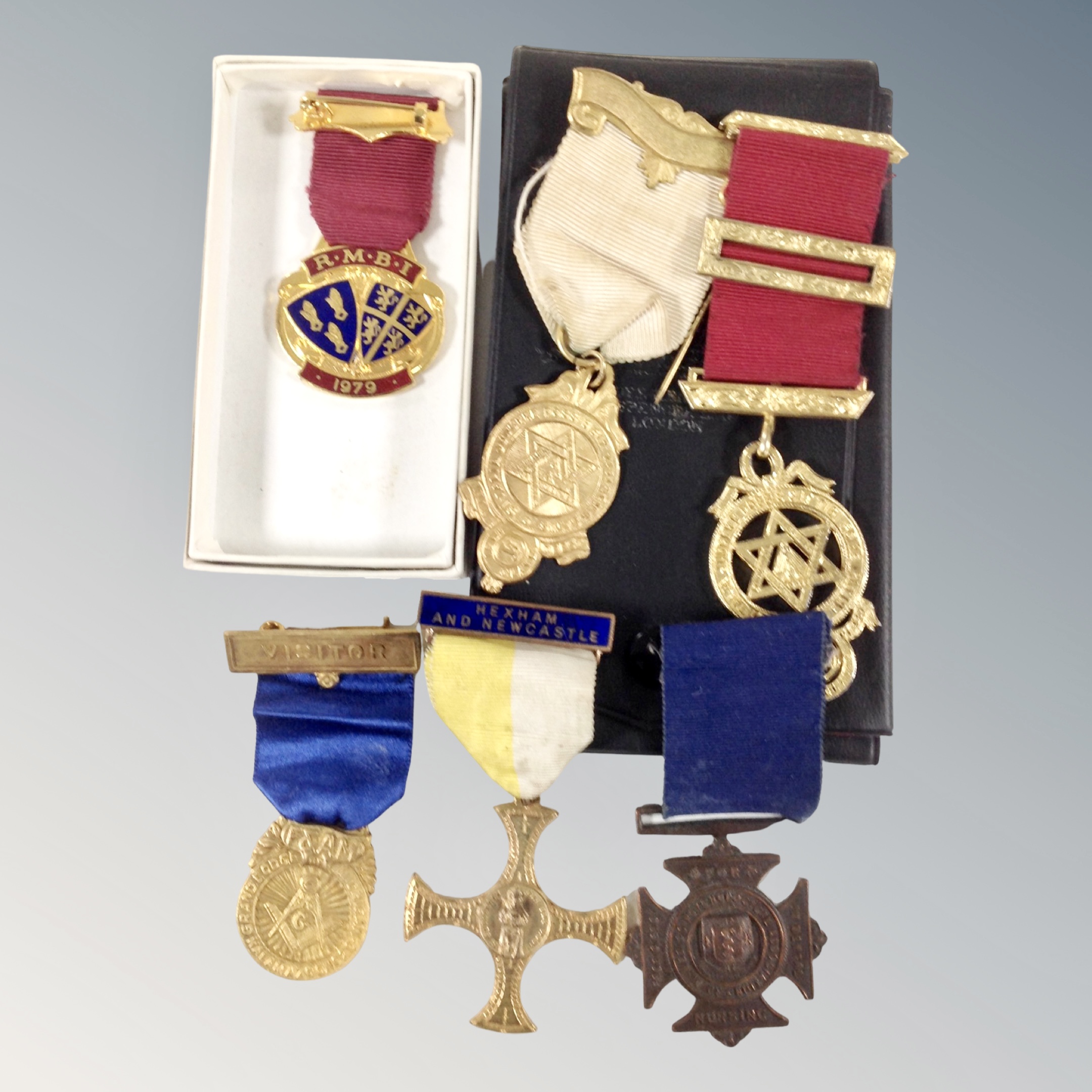 A group of six medals on ribbons, Masonic and Steward medals,