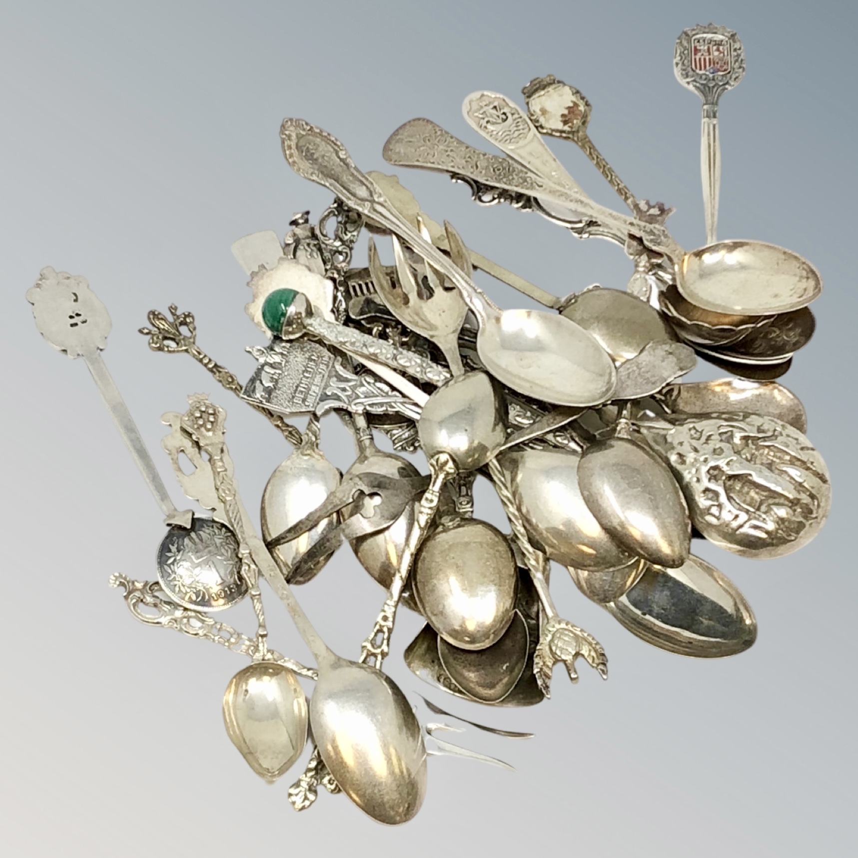 A collection of various items of silver cutlery