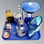 A tray of glass ware, 20th century coloured glass vases, paperweights,