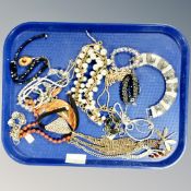 A tray of costume jewellery,