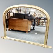 A gilt framed arch topped Victorian style mirror