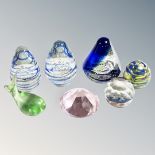 Seven assorted glass and crystal paperweights and ornaments