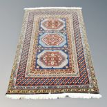 A Caucasian rug of geometric design,