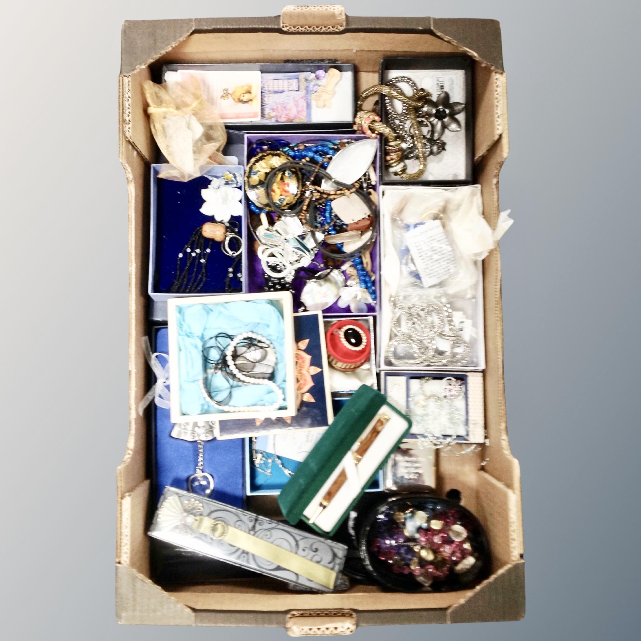 A box of assorted costume jewellery, boxes,