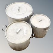Three aluminium catering cooking pots with lids