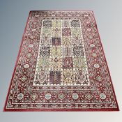 A modern machine made Persian rug of Ghom design,