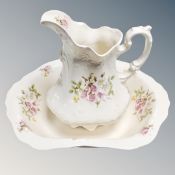 A cream floral wash jug and basin together with further twin handled foot bath