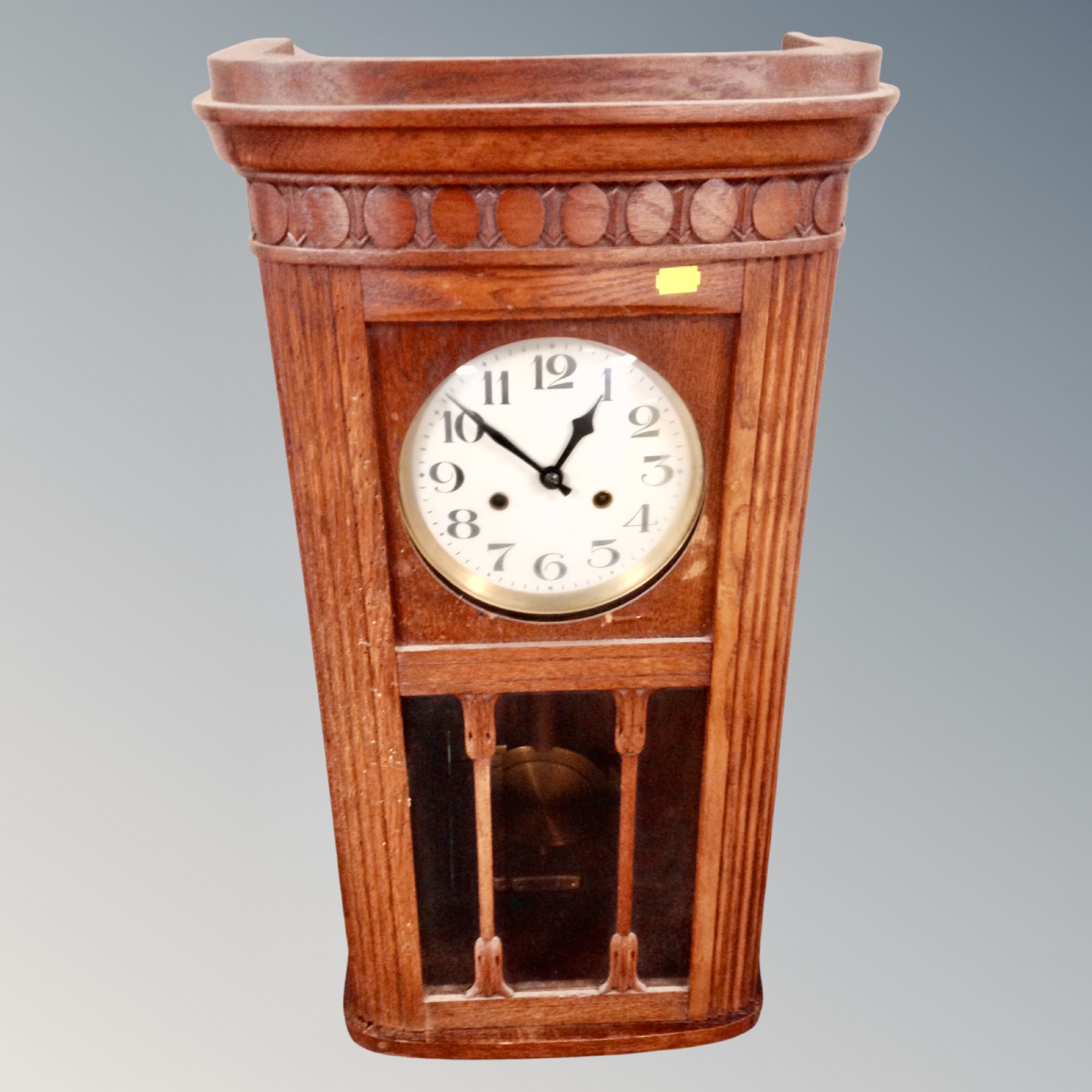 An Edwardian oak cased eight-day wall clock (af)