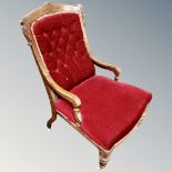 A Victorian mahogany lady's armchair in red dralon