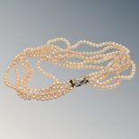 A good quality 15 inch five strand pearl necklace on two tone 14ct gold catch