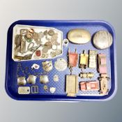 A tray of play worn die cast vehicles, brass circular bait box, military badges, decanter lables,