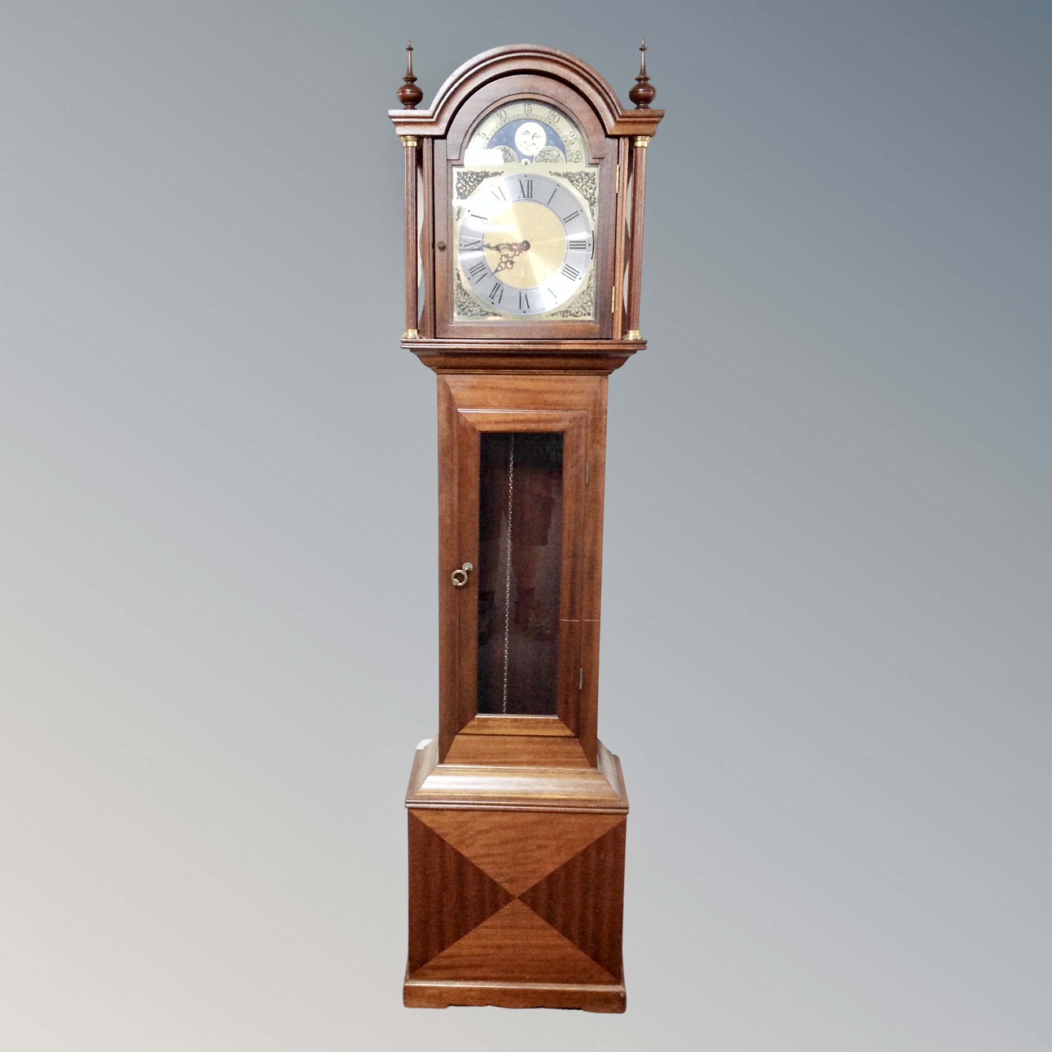 A contemporary longcase clock with moonphase dial