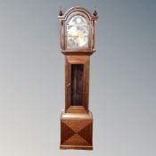 A contemporary longcase clock with moonphase dial