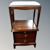 A Stag bedside stand fitted a drawer together with a dressing table stool