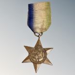 A WW II Atlantic star medal on ribbon