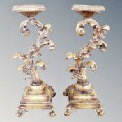 Two ornate gilt candle holders