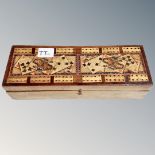 A Victorian cribbage box containing two sets of playing cards