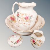 A 19th century S F and Company four-piece floral wash set