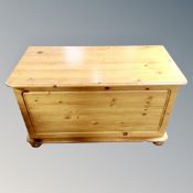 A contemporary pine blanket box