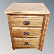 An Edwardian three drawer pedestal chest